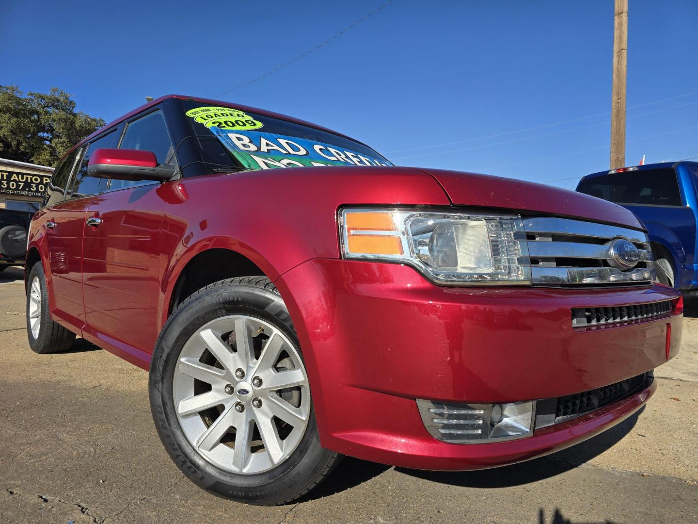 2009 RED Ford Flex SEL (2FMDK52C49B) with an 3.5L V6 DOHC 24V engine, 6-Speed Automatic transmission, located at 2660 S.Garland Avenue, Garland, TX, 75041, (469) 298-3118, 32.885387, -96.656776 - Photo#0