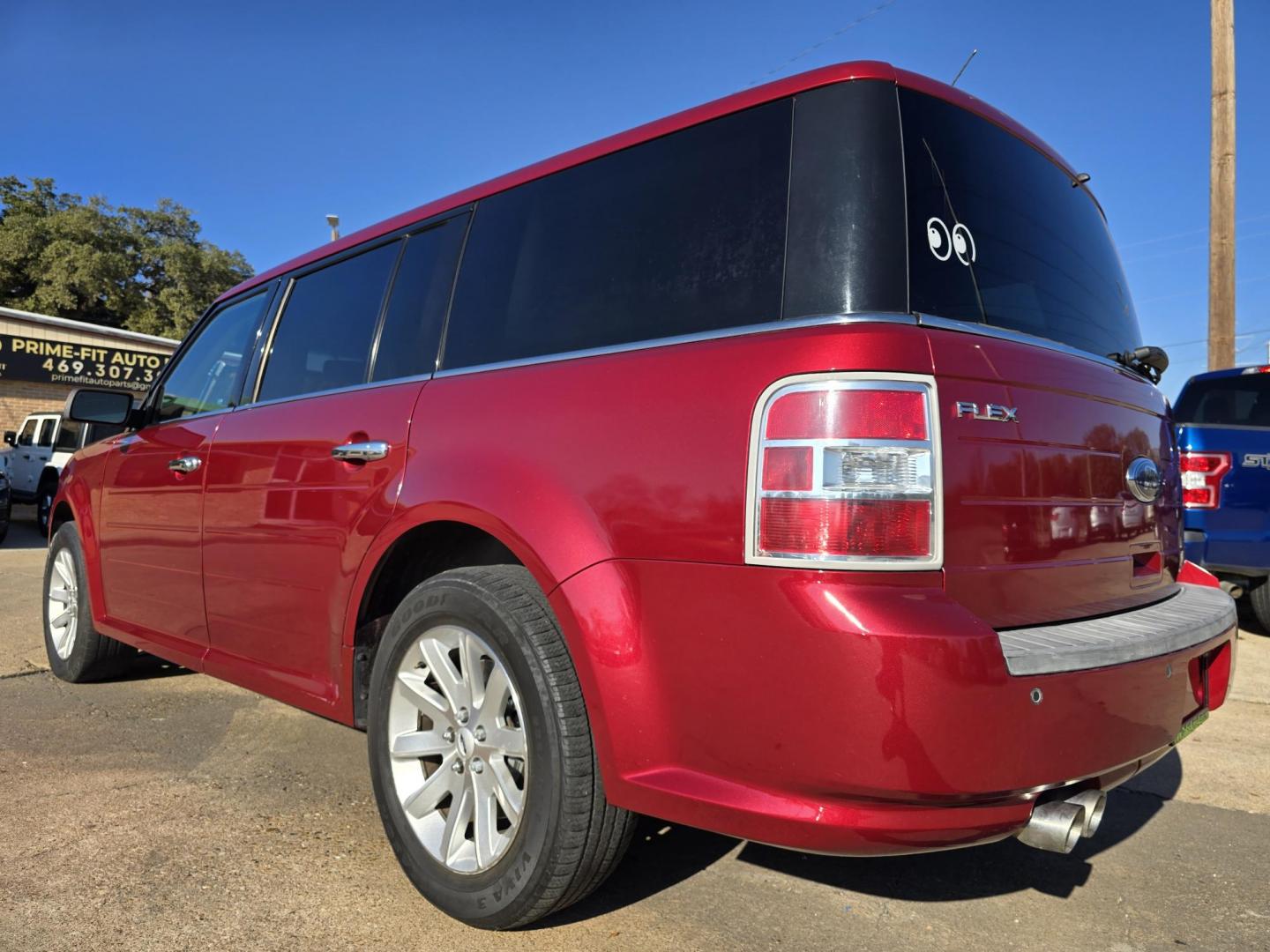 2009 RED Ford Flex SEL (2FMDK52C49B) with an 3.5L V6 DOHC 24V engine, 6-Speed Automatic transmission, located at 2660 S.Garland Avenue, Garland, TX, 75041, (469) 298-3118, 32.885387, -96.656776 - Photo#5