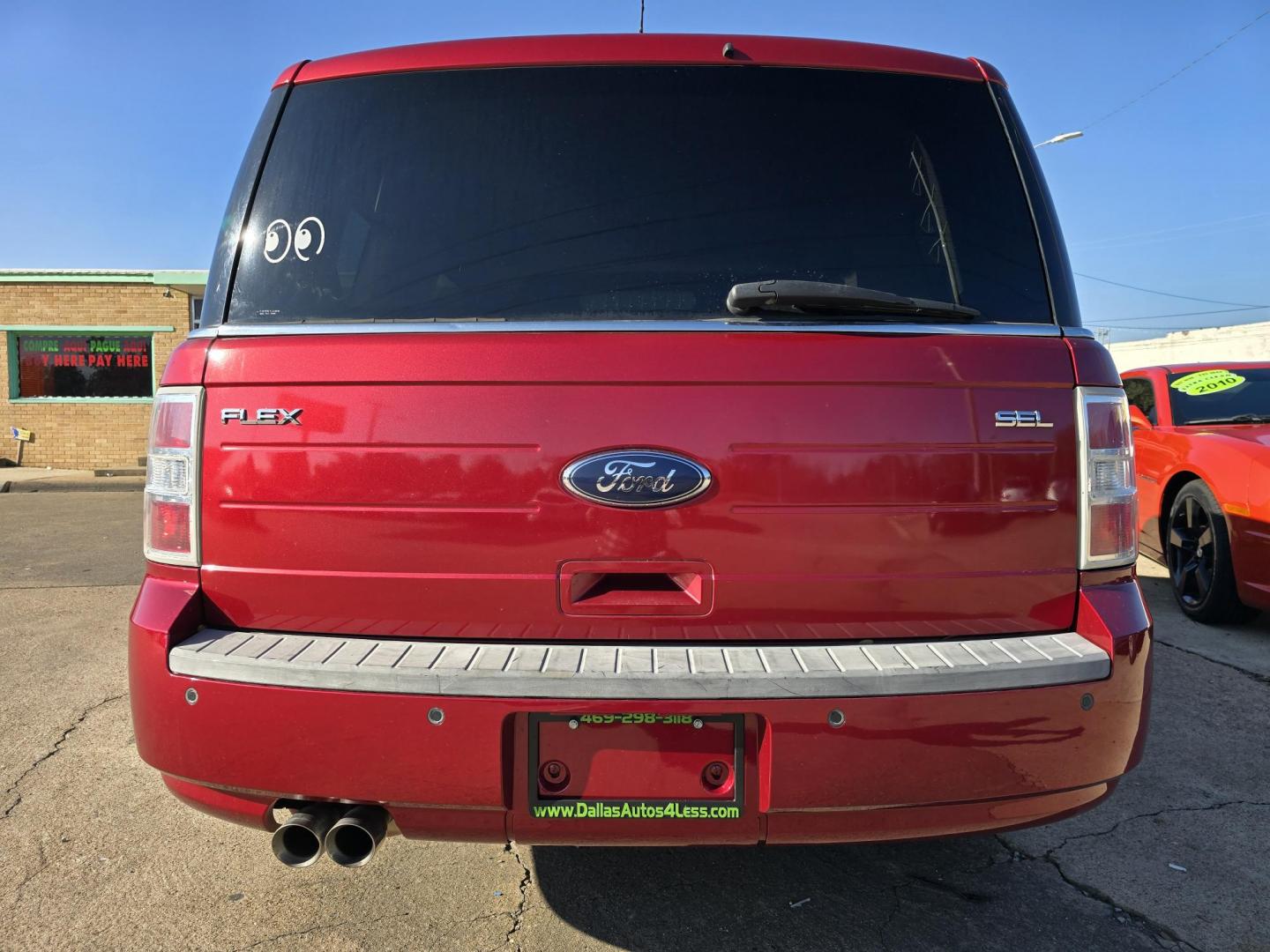 2009 RED Ford Flex SEL (2FMDK52C49B) with an 3.5L V6 DOHC 24V engine, 6-Speed Automatic transmission, located at 2660 S.Garland Avenue, Garland, TX, 75041, (469) 298-3118, 32.885387, -96.656776 - Photo#4