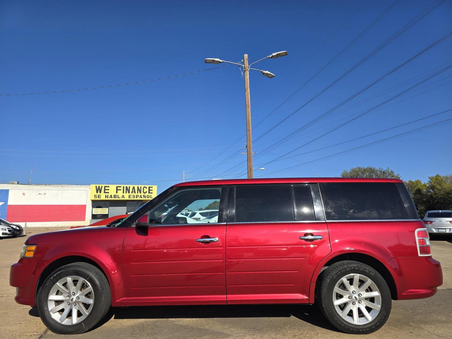 2009 RED Ford Flex SEL (2FMDK52C49B) with an 3.5L V6 DOHC 24V engine, 6-Speed Automatic transmission, located at 2660 S.Garland Avenue, Garland, TX, 75041, (469) 298-3118, 32.885387, -96.656776 - Photo#6