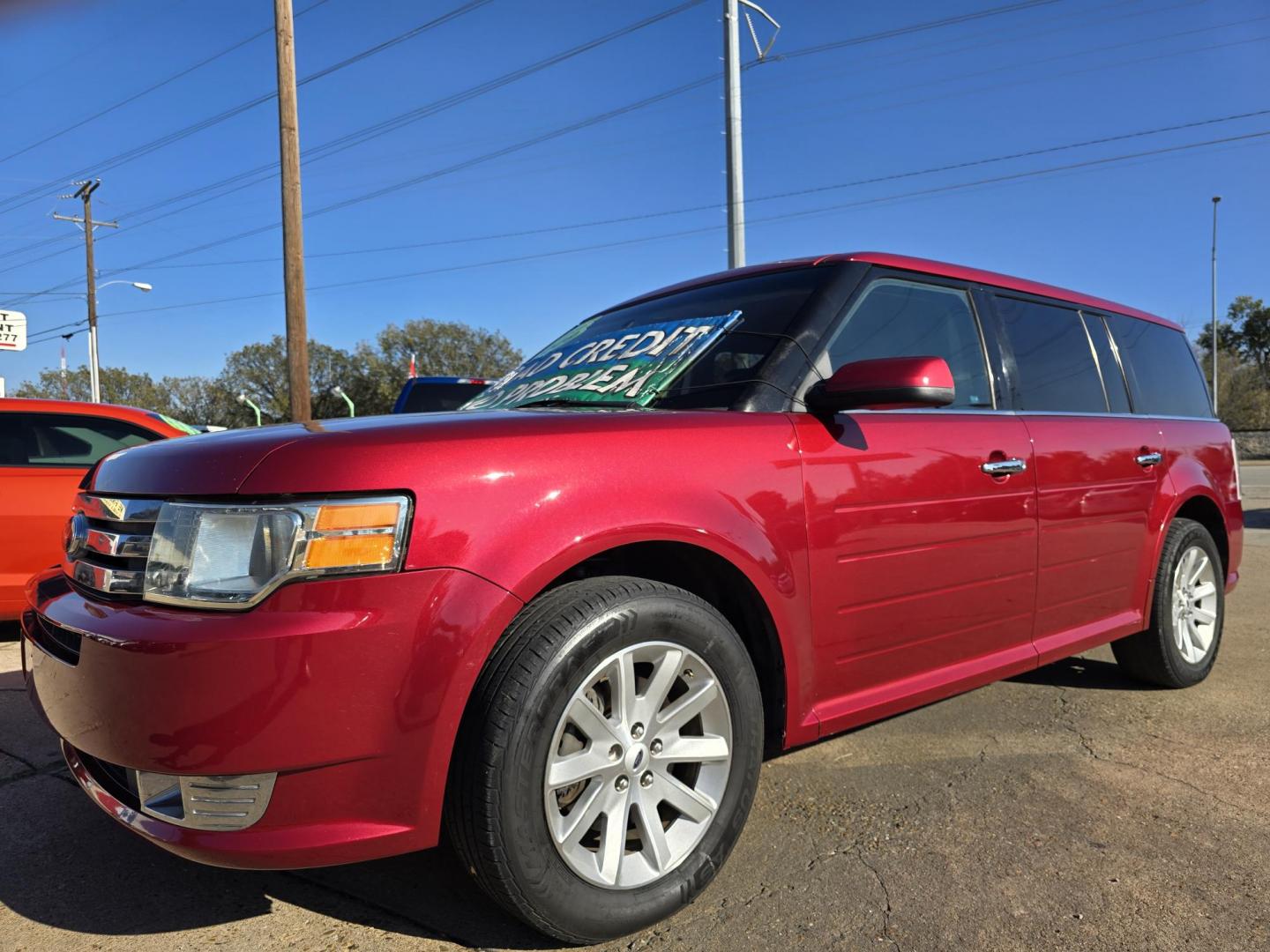 2009 RED Ford Flex SEL (2FMDK52C49B) with an 3.5L V6 DOHC 24V engine, 6-Speed Automatic transmission, located at 2660 S.Garland Avenue, Garland, TX, 75041, (469) 298-3118, 32.885387, -96.656776 - Photo#7
