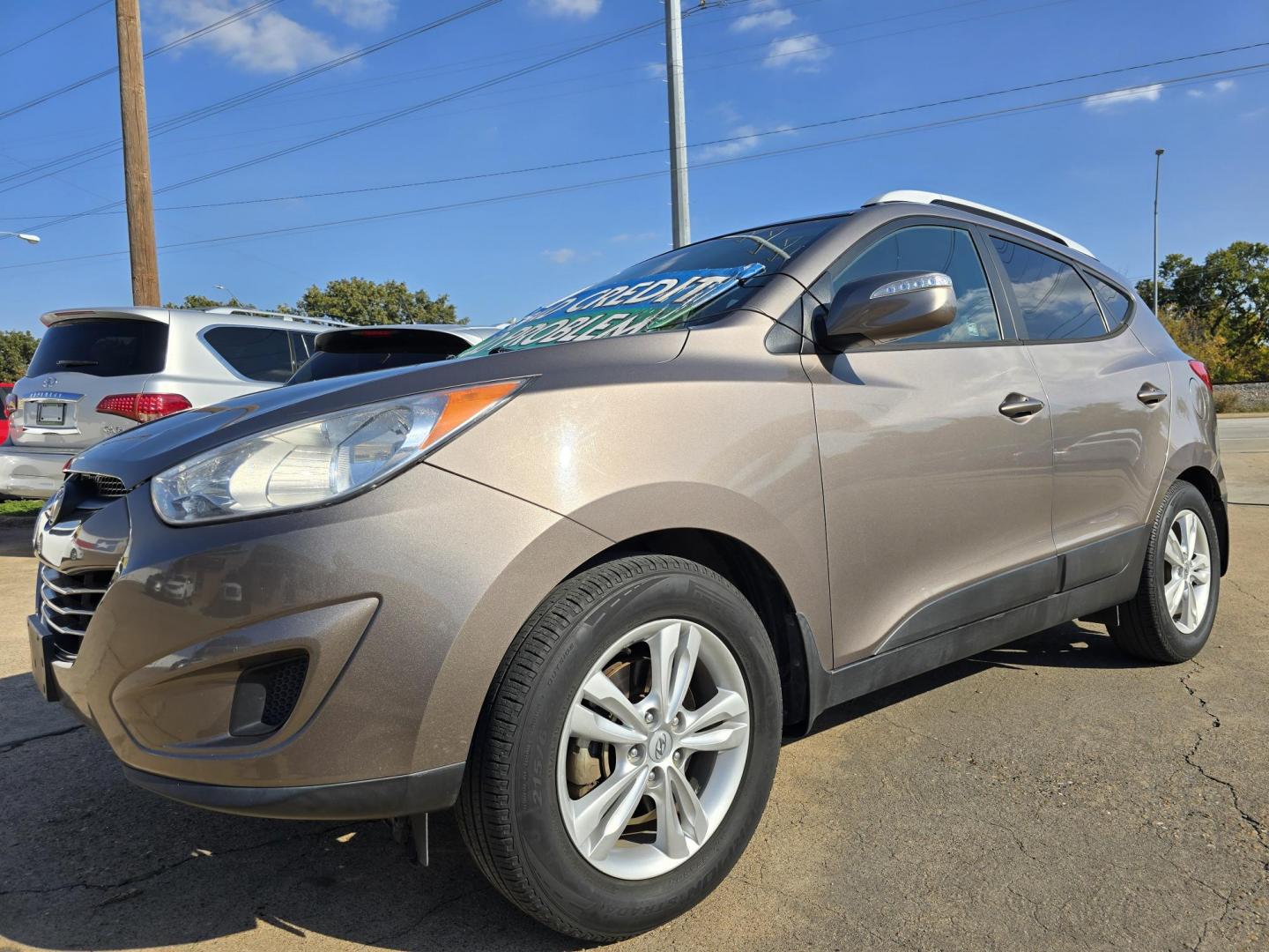 2012 Hyundai Tucson GLS (KM8JU3AC6CU) with an 2.4L L4 DOHC 16V engine, 6-Speed Automatic transmission, located at 2660 S.Garland Avenue, Garland, TX, 75041, (469) 298-3118, 32.885387, -96.656776 - Photo#7