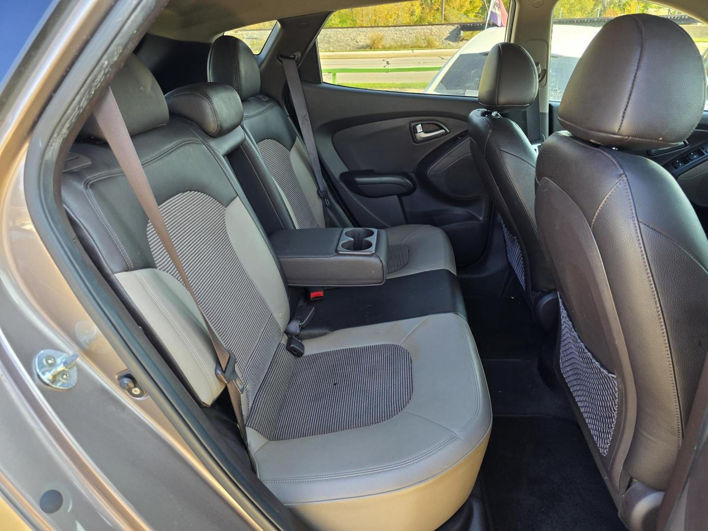 2012 Hyundai Tucson GLS (KM8JU3AC6CU) with an 2.4L L4 DOHC 16V engine, 6-Speed Automatic transmission, located at 2660 S.Garland Avenue, Garland, TX, 75041, (469) 298-3118, 32.885387, -96.656776 - Photo#14