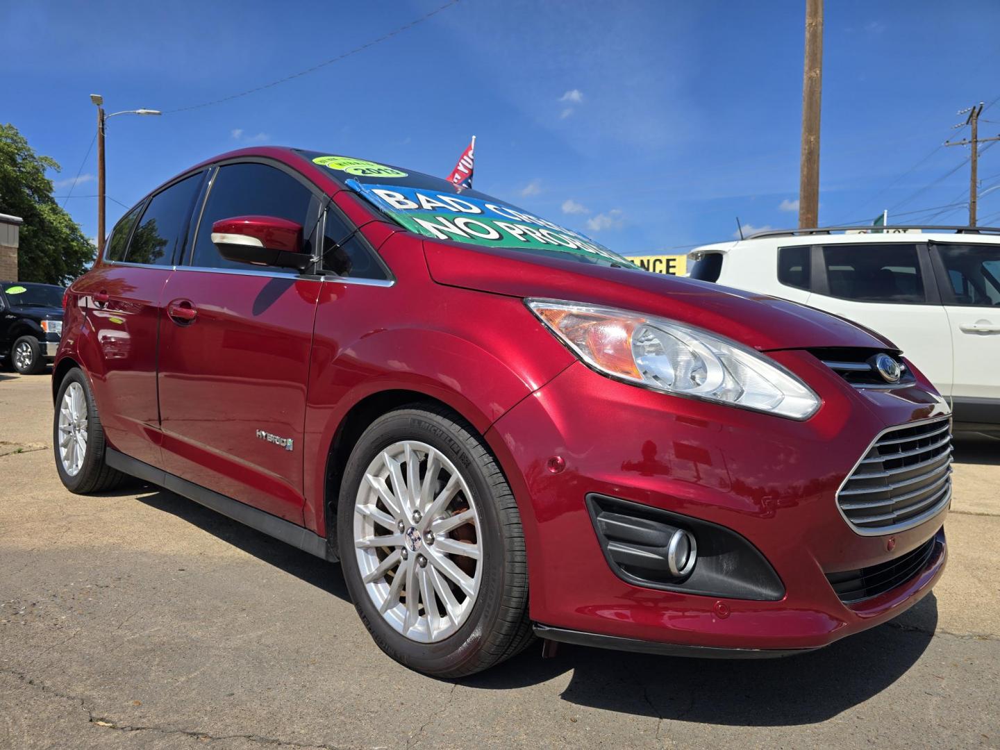 2013 RED Ford C-Max SEL (1FADP5BU1DL) with an 2.0L L4 DOHC 16V HYBRID engine, Continuously Variable Transmission transmission, located at 2660 S.Garland Avenue, Garland, TX, 75041, (469) 298-3118, 32.885387, -96.656776 - Photo#1