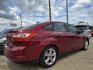 2014 RED /BEIGE FORD FOCUS SE SE (1FADP3F24EL) , AUTO transmission, located at 2660 S.Garland Avenue, Garland, TX, 75041, (469) 298-3118, 32.885387, -96.656776 - Welcome to DallasAutos4Less, one of the Premier BUY HERE PAY HERE Dealers in the North Dallas Area. We specialize in financing to people with NO CREDIT or BAD CREDIT. We need proof of income, proof of residence, and a ID. Come buy your new car from us today!! This is a Very clean 2014 FORD FOCUS - Photo#3