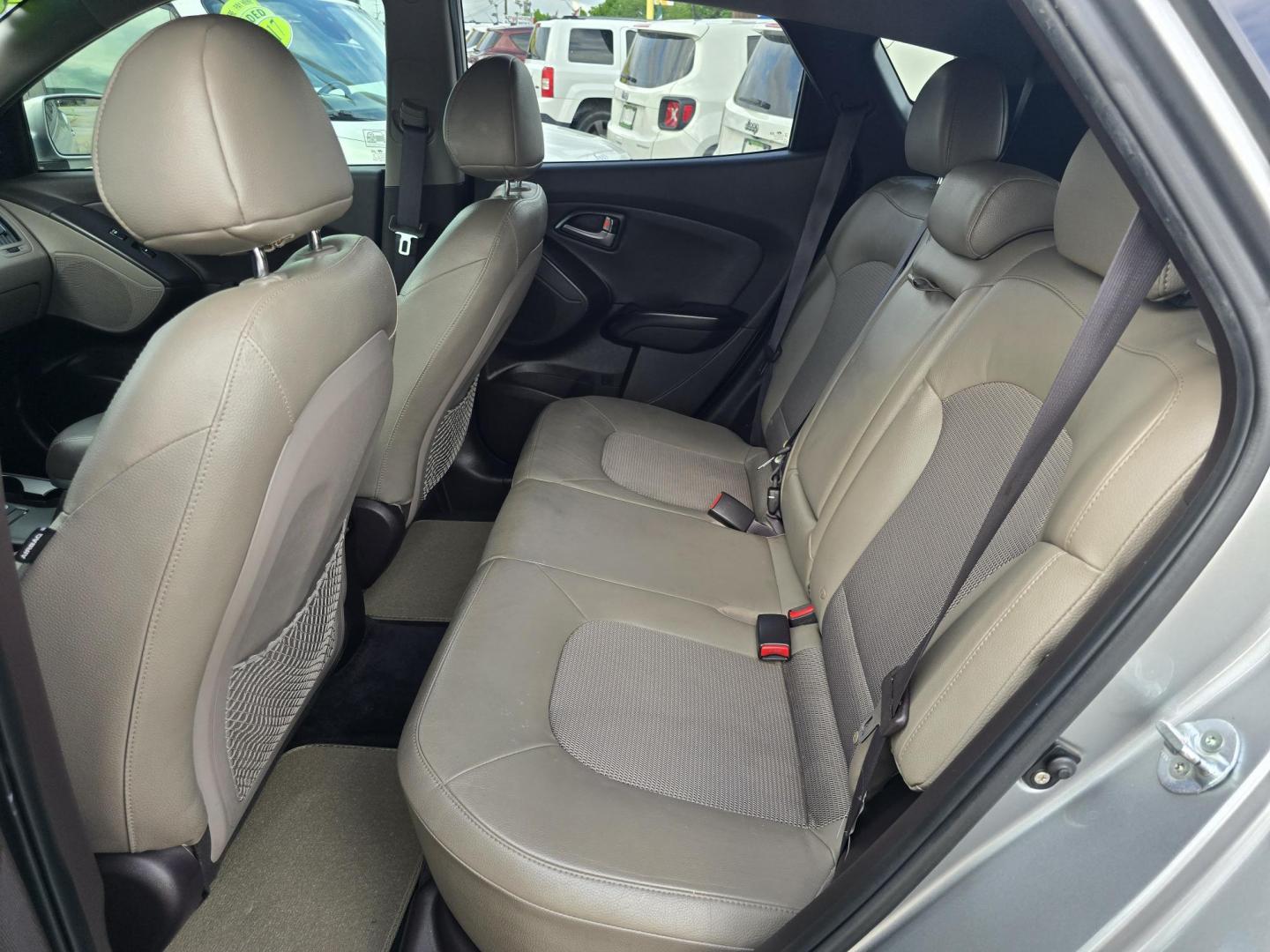 2015 GRAY Hyundai Tucson GLS (KM8JU3AG9FU) with an 2.4L L4 DOHC 16V engine, 6-Speed Automatic transmission, located at 2660 S.Garland Avenue, Garland, TX, 75041, (469) 298-3118, 32.885387, -96.656776 - Photo#16