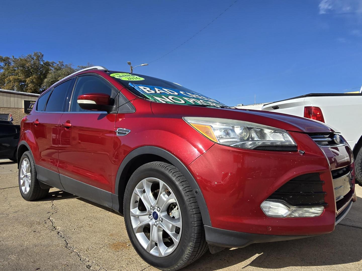 2016 RED Ford Escape Titanium (1FMCU0J96GU) with an 2.0L L4 DOHC 16V engine, 6-Speed Automatic transmission, located at 2660 S.Garland Avenue, Garland, TX, 75041, (469) 298-3118, 32.885387, -96.656776 - Photo#1