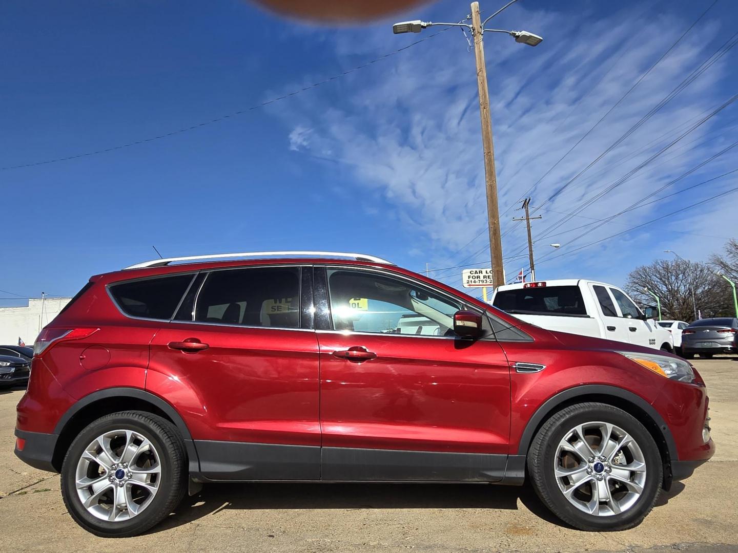 2016 RED Ford Escape Titanium (1FMCU0J96GU) with an 2.0L L4 DOHC 16V engine, 6-Speed Automatic transmission, located at 2660 S.Garland Avenue, Garland, TX, 75041, (469) 298-3118, 32.885387, -96.656776 - Photo#2