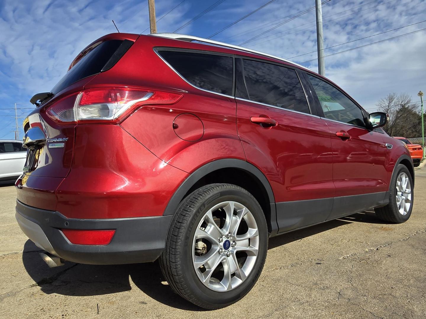 2016 RED Ford Escape Titanium (1FMCU0J96GU) with an 2.0L L4 DOHC 16V engine, 6-Speed Automatic transmission, located at 2660 S.Garland Avenue, Garland, TX, 75041, (469) 298-3118, 32.885387, -96.656776 - Photo#3