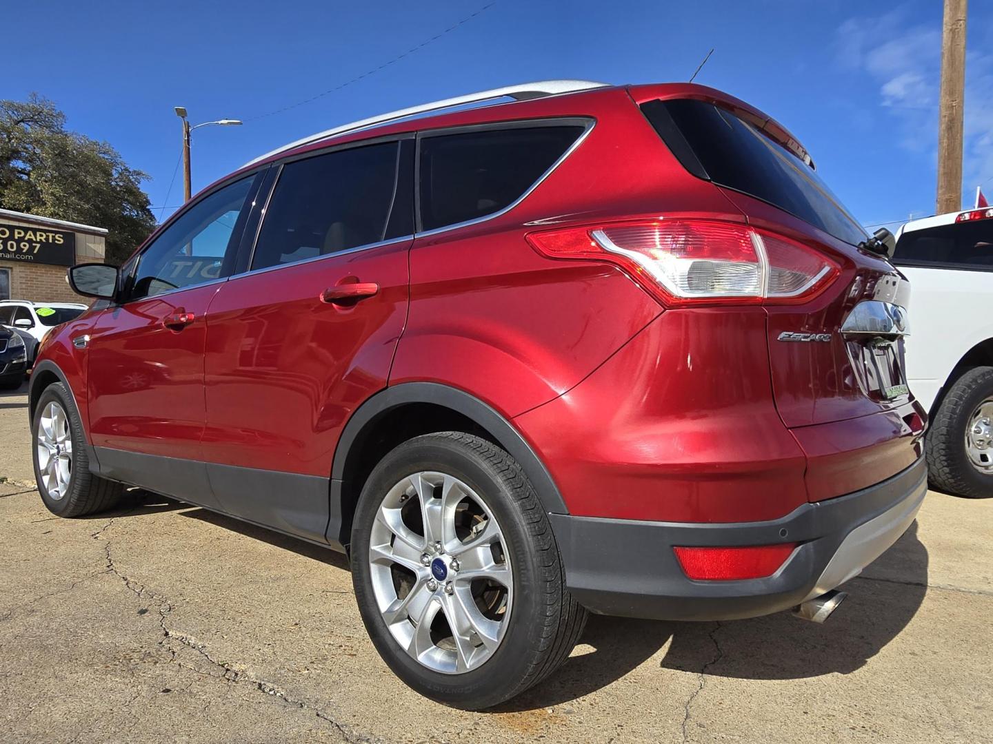 2016 RED Ford Escape Titanium (1FMCU0J96GU) with an 2.0L L4 DOHC 16V engine, 6-Speed Automatic transmission, located at 2660 S.Garland Avenue, Garland, TX, 75041, (469) 298-3118, 32.885387, -96.656776 - Photo#5