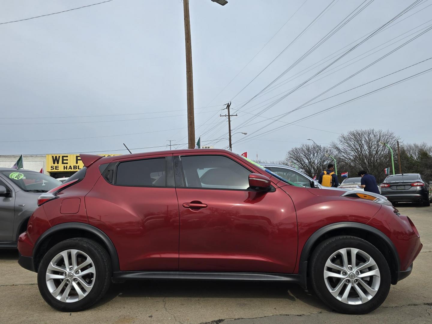 2016 RED Nissan Juke S (JN8AF5MR2GT) with an 1.6L L4 DOHC 16V TURBO engine, CVT transmission, located at 2660 S.Garland Avenue, Garland, TX, 75041, (469) 298-3118, 32.885387, -96.656776 - Photo#2