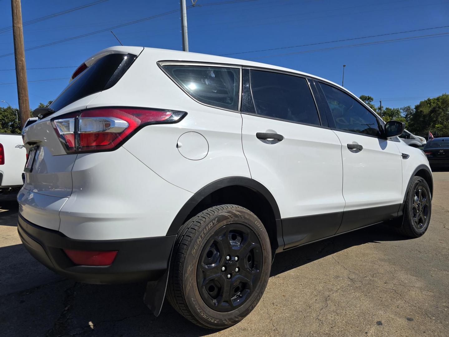 2018 Ford Escape S (1FMCU0F77JU) with an 2.5L L4 DOHC 16V engine, 6A transmission, located at 2660 S.Garland Avenue, Garland, TX, 75041, (469) 298-3118, 32.885387, -96.656776 - Welcome to DallasAutos4Less, one of the Premier BUY HERE PAY HERE Dealers in the North Dallas Area. We specialize in financing to people with NO CREDIT or BAD CREDIT. We need proof of income, proof of residence, and a ID. Come buy your new car from us today!! This is a Super Clean 2018 FORD ESCAP - Photo#3